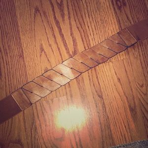Tan man made leather belt
